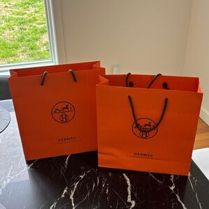 Bundling 2 Hermes shopping bags